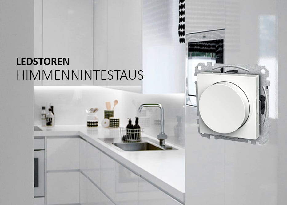 LEDSTOREN HIMMENNINTESTAUS blogi banneri - LedStore Moderni keittiö, jossa valkoiset kaapit; etualalla on suuri pyöreä himmennyskytkin LED-valaistuksen ohjaamiseen, teksti "LEDSTOREN HIMMENNINTESTAUS" näkyy vasemmalla.